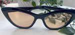 Cateye solbriller i sort med lysebrunt glas